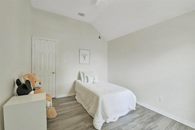 18415 Pin Oak Bend Dr, Cypress, TX 77433 - bedroom with wood finished floors, lofted ceiling, and ceiling fan