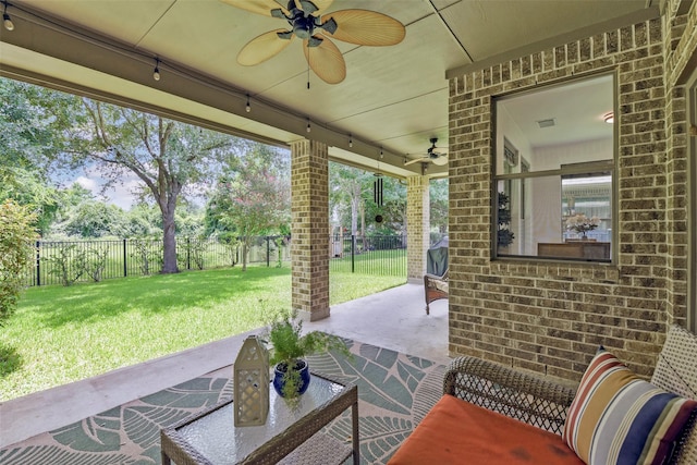 18415 Pin Oak Bend Dr, Cypress, TX 77433 - fenced backyard featuring a ceiling fan and a patio area