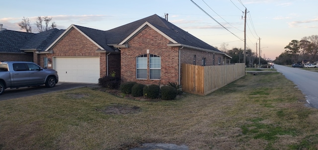 71 N Forrest Ave, La Porte, TX 77571 - view of front of house with brick siding, an attached garage, concrete driveway, and a shingled roof