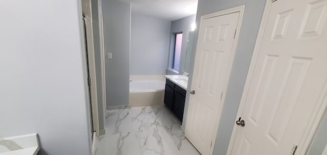 71 N Forrest Ave, La Porte, TX 77571 - bathroom featuring vanity, a garden tub, a stall shower, and marble look tile flooring
