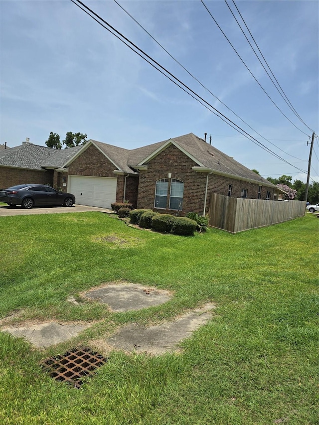 71 N Forrest Ave, La Porte, TX 77571 - ranch-style house featuring brick siding, a garage, concrete driveway, and roof with shingles