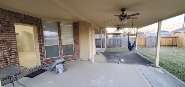 71 N Forrest Ave, La Porte, TX 77571 - fenced backyard with a patio area and ceiling fan