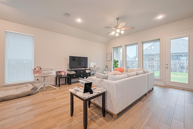 7522 Zion Grove Ct, Katy, TX 77493 - living area with light wood finished floors, a ceiling fan, lofted ceiling, and recessed lighting