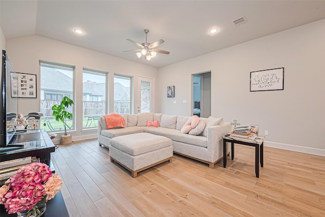 7522 Zion Grove Ct, Katy, TX 77493 - living room with light wood-style flooring, ceiling fan, recessed lighting, and vaulted ceiling
