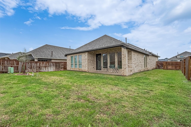7522 Zion Grove Ct, Katy, TX 77493 - back of property featuring brick siding and a fenced backyard