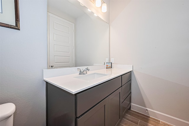 7522 Zion Grove Ct, Katy, TX 77493 - bathroom featuring vanity and wood finished floors