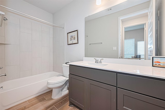 7522 Zion Grove Ct, Katy, TX 77493 - full bathroom with wood finished floors, vanity, and shower / tub combination