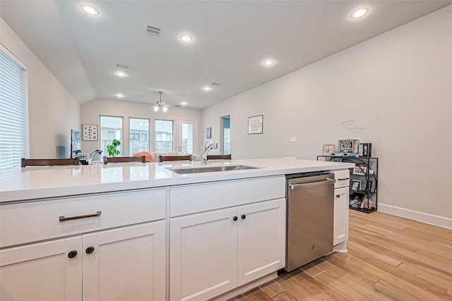 7522 Zion Grove Ct, Katy, TX 77493 - kitchen with dishwasher, light wood-style floors, white cabinetry, recessed lighting, and ceiling fan