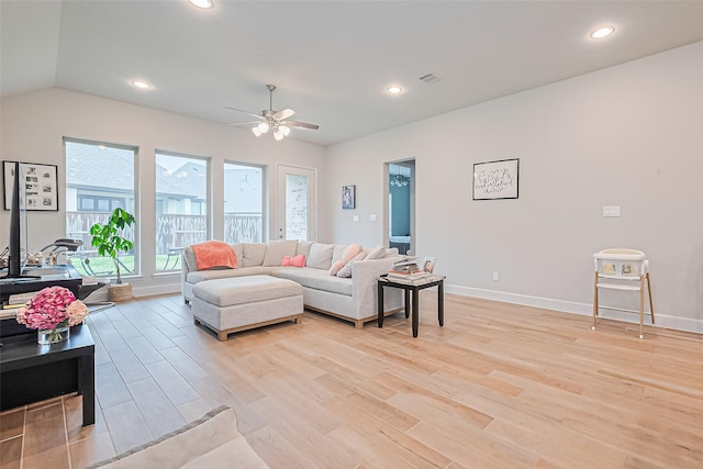 7522 Zion Grove Ct, Katy, TX 77493 - living room featuring light wood finished floors, ceiling fan, recessed lighting, and vaulted ceiling