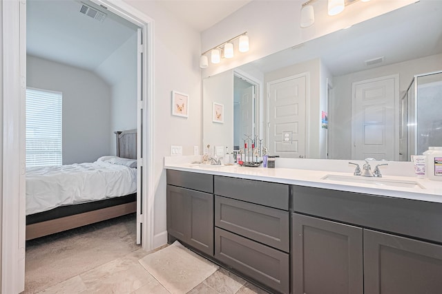 7522 Zion Grove Ct, Katy, TX 77493 - ensuite bathroom featuring double vanity and an enclosed shower