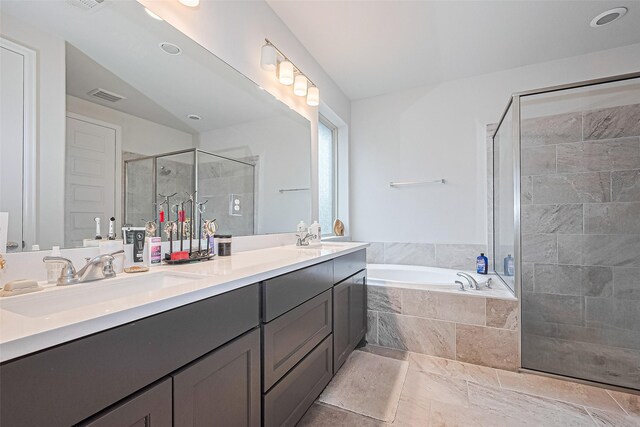 7522 Zion Grove Ct, Katy, TX 77493 - bathroom with double vanity, a shower stall, and a bath