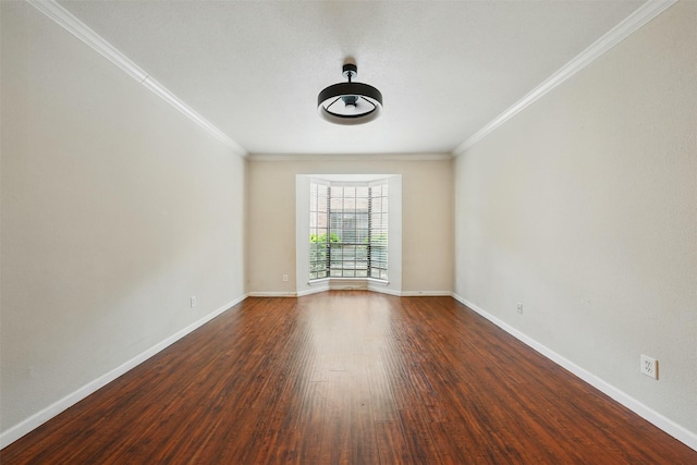 2255 Braeswood Park Dr Unit 181, Houston, TX 77030 - spare room with ornamental molding and dark wood-style flooring