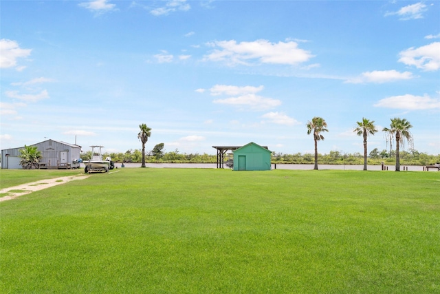 1040 County Road 206, Sargent, TX 77414 - view of grassy yard featuring an outdoor structure