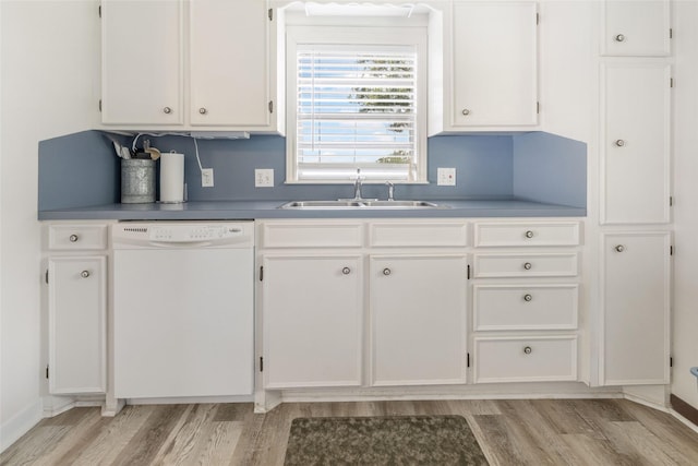 1040 County Road 206, Sargent, TX 77414 - kitchen featuring white dishwasher, light wood-style floors, and white cabinetry
