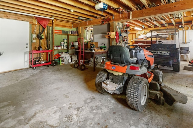 1040 County Road 206, Sargent, TX 77414 - garage featuring a garage door opener