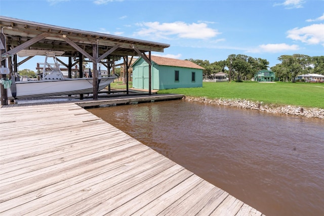 1040 County Road 206, Sargent, TX 77414 - dock area with boat lift, a water view, and a yard