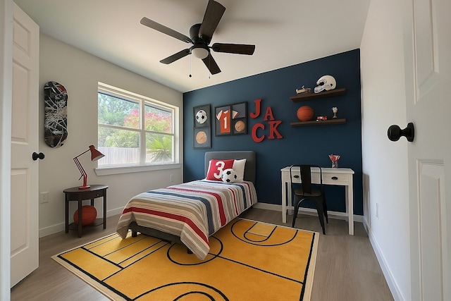 2630 34th St, Port Arthur, TX 77640 - bedroom with wood finished floors and a ceiling fan