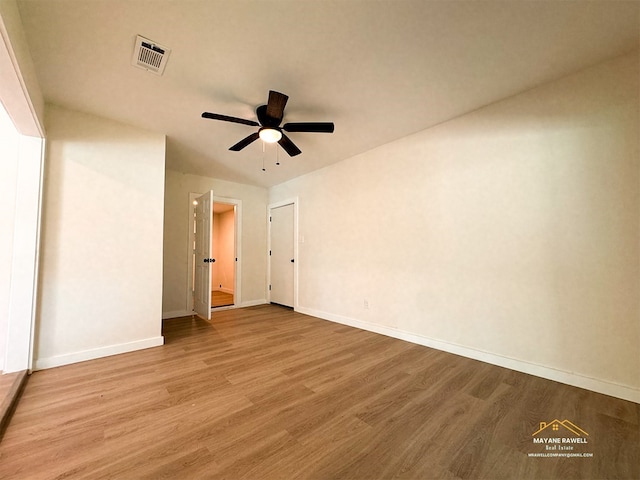 2630 34th St, Port Arthur, TX 77640 - empty room with wood finished floors and ceiling fan