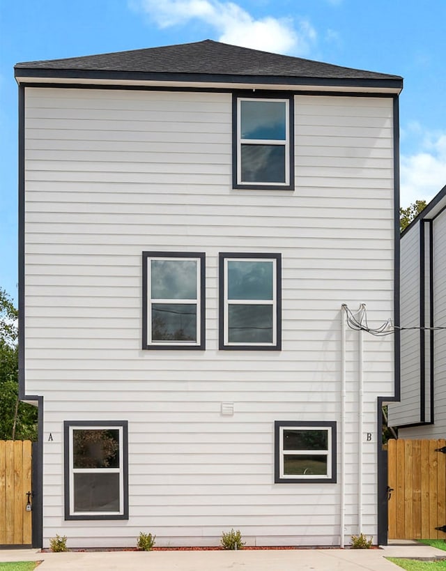 6315 Sandra St, Houston, TX 77028 - view of home's exterior featuring a shingled roof