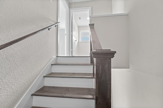 6313 Sandra St, Houston, TX 77028 - staircase featuring a textured wall