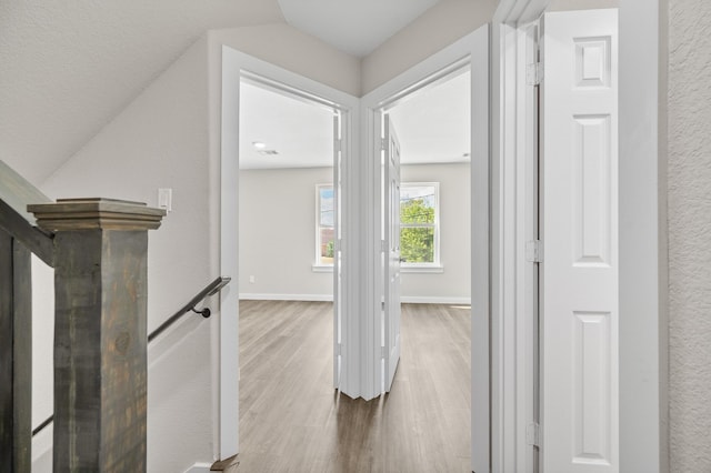 6313 Sandra St, Houston, TX 77028 - corridor featuring wood finished floors and baseboards