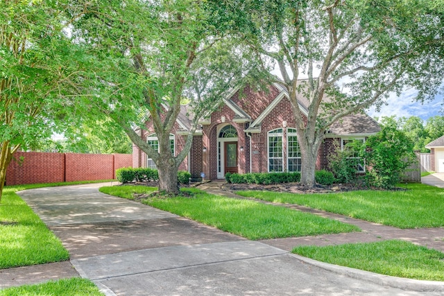 7422 Quiet Glen Dr, Sugar Land, TX 77479 - view of front of house with brick siding and driveway
