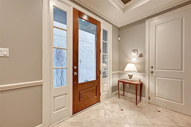 109 Dennis St, Houston, TX 77006 - foyer with crown molding and light tile patterned floors