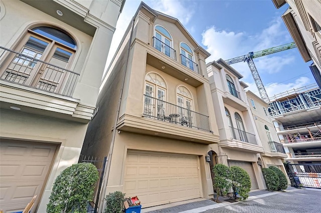 109 Dennis St, Houston, TX 77006 - view of building exterior featuring a garage