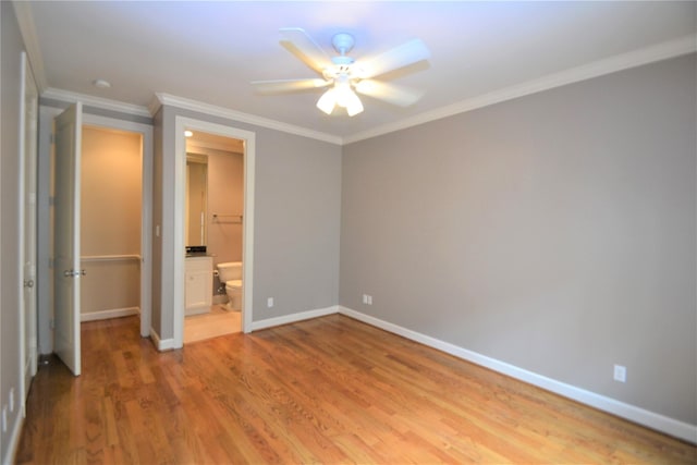 109 Dennis St, Houston, TX 77006 - unfurnished bedroom featuring light wood-type flooring, ornamental molding, ensuite bathroom, and a ceiling fan