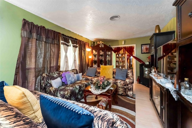 408 Rolling Wood Rd, Baytown, TX 77520 - living area with a textured ceiling and bar