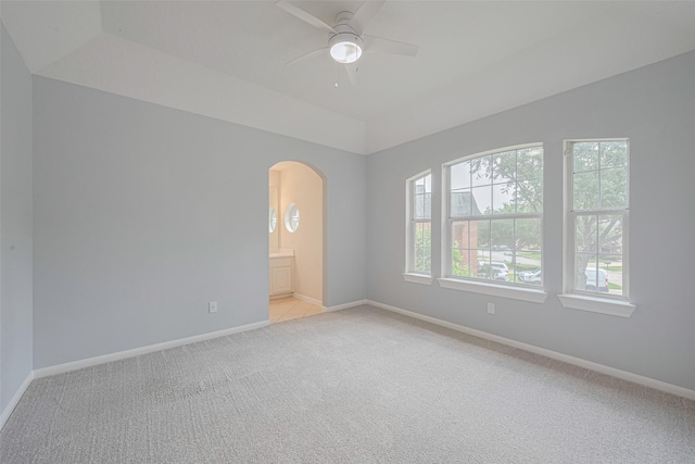 9526 Fern Wood Frst, Houston, TX 77040 - unfurnished room featuring light colored carpet, ceiling fan, and arched walkways