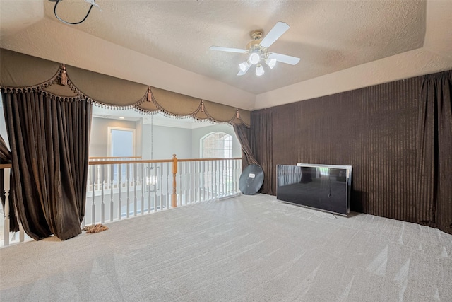 9526 Fern Wood Frst, Houston, TX 77040 - carpeted empty room featuring a ceiling fan and a textured ceiling