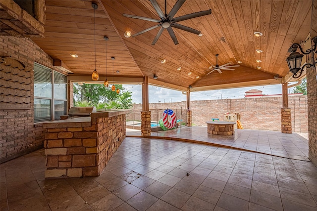 9526 Fern Wood Frst, Houston, TX 77040 - view of patio with a ceiling fan, outdoor dining area, an outdoor kitchen, and a gazebo
