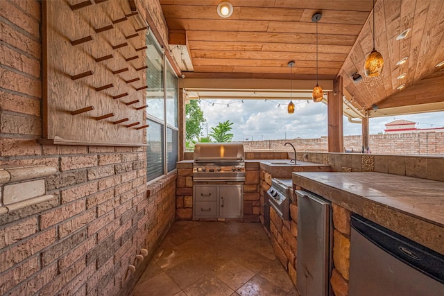 9526 Fern Wood Frst, Houston, TX 77040 - view of patio / terrace featuring exterior kitchen and a sink