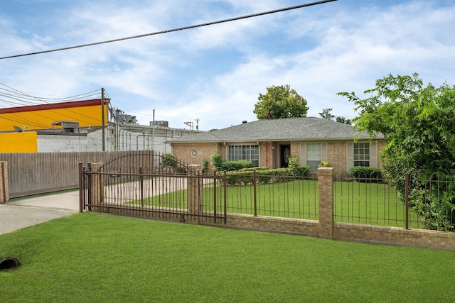 740 Post St, Houston, TX 77022 - view of front of house with a fenced front yard, brick siding, and concrete driveway