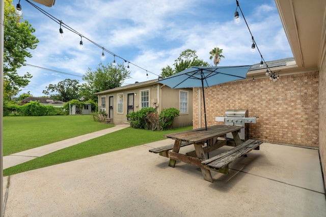 740 Post St, Houston, TX 77022 - view of patio featuring area for grilling and outdoor dining area