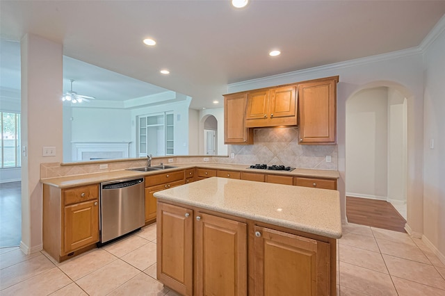 7927 Chateau Point Ln, Houston, TX 77041 - kitchen featuring stainless steel dishwasher, arched walkways, light tile patterned floors, tasteful backsplash, and gas stovetop