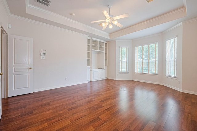 7927 Chateau Point Ln, Houston, TX 77041 - spare room featuring a tray ceiling, ceiling fan, wood finished floors, and ornamental molding