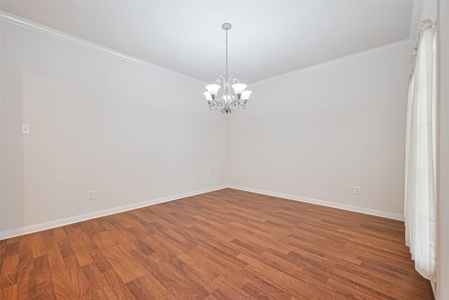 7927 Chateau Point Ln, Houston, TX 77041 - empty room featuring a chandelier, light wood-style flooring, and ornamental molding