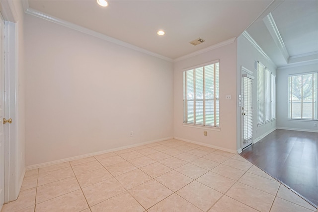 7927 Chateau Point Ln, Houston, TX 77041 - empty room featuring crown molding, light tile patterned floors, and recessed lighting