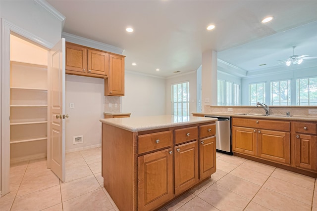 7927 Chateau Point Ln, Houston, TX 77041 - kitchen with dishwasher, brown cabinets, light countertops, light tile patterned flooring, and crown molding