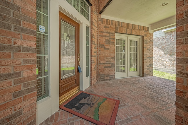 7927 Chateau Point Ln, Houston, TX 77041 - entrance to property with a porch and brick siding