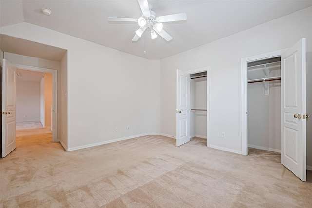 7927 Chateau Point Ln, Houston, TX 77041 - unfurnished bedroom with multiple closets, light carpet, and ceiling fan