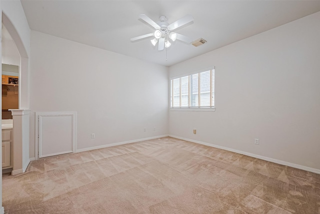 7927 Chateau Point Ln, Houston, TX 77041 - spare room with a ceiling fan, light carpet, and arched walkways