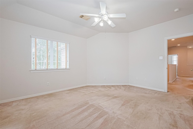 7927 Chateau Point Ln, Houston, TX 77041 - empty room with ceiling fan, light colored carpet, plenty of natural light, vaulted ceiling, and recessed lighting