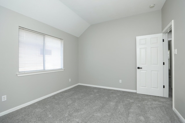 2522 Cardinal Elm St, Fresno, TX 77545 - empty room featuring carpet, lofted ceiling, and a smoke detector