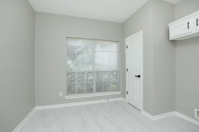 2522 Cardinal Elm St, Fresno, TX 77545 - empty room featuring light marble finish flooring and baseboards