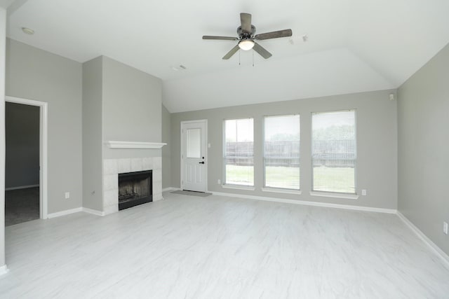 2522 Cardinal Elm St, Fresno, TX 77545 - unfurnished living room featuring lofted ceiling, a ceiling fan, and a fireplace