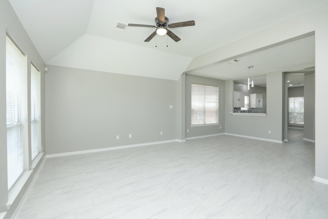 2522 Cardinal Elm St, Fresno, TX 77545 - unfurnished living room with ceiling fan, healthy amount of natural light, and lofted ceiling