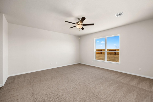 14109 Freeboard Dr, Texas City, TX 77510 - carpeted empty room featuring a ceiling fan and baseboards